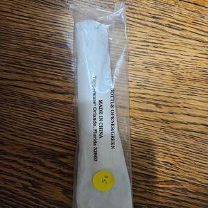 Tupperware bottle opener NEW in package